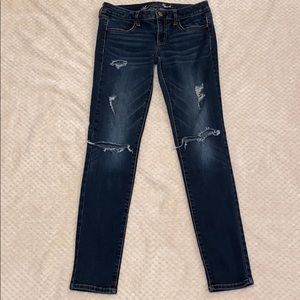Blue distressed American Eagles jeans
